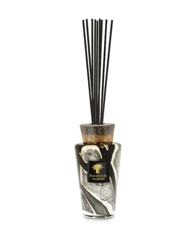 Baobab Collection Totem Stones Marble diffuser with black and silver ceramic cap, featuring fragrance sticks.