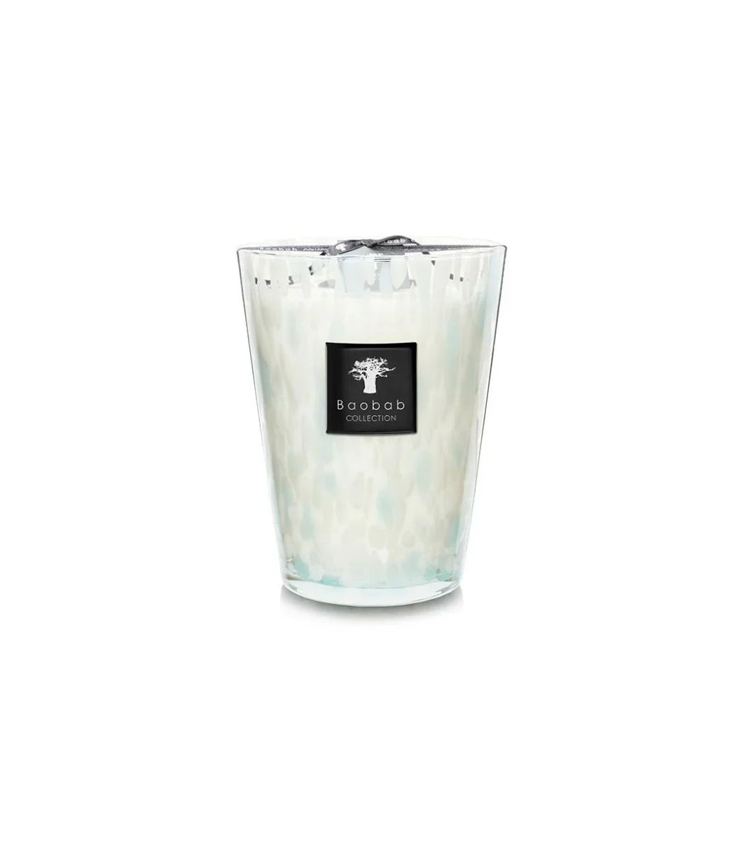 Baobab Collection Sapphire Pearls candle in a hand-blown glass holder with azure inlays.