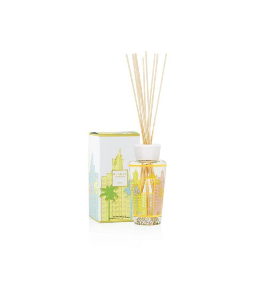 Baobab Collection My First Baobab Miami diffuser with pastel packaging and reed sticks, inspired by South Beach architecture.