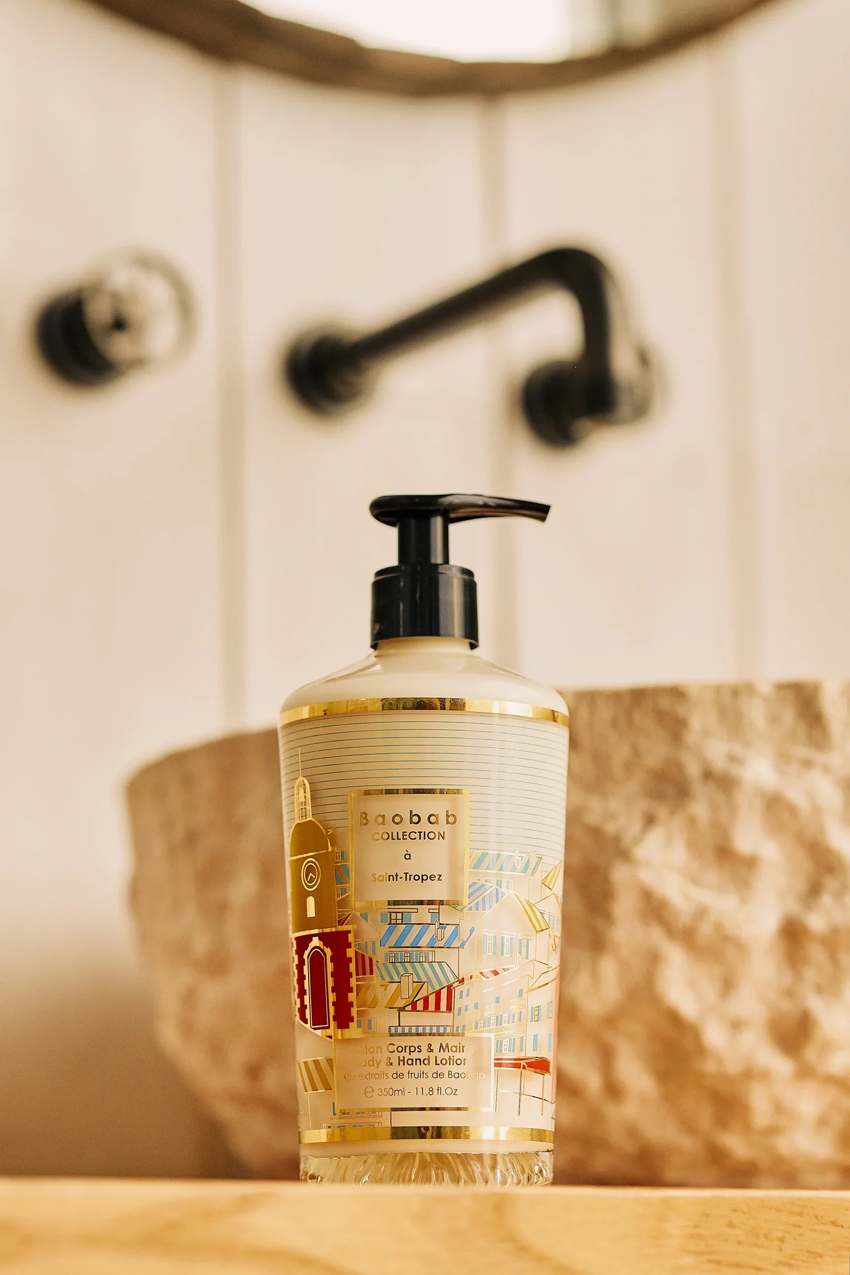 Baobab Collection 350ml body and hand lotion with Saint-Tropez design, light texture for fresh moisturizing effect.