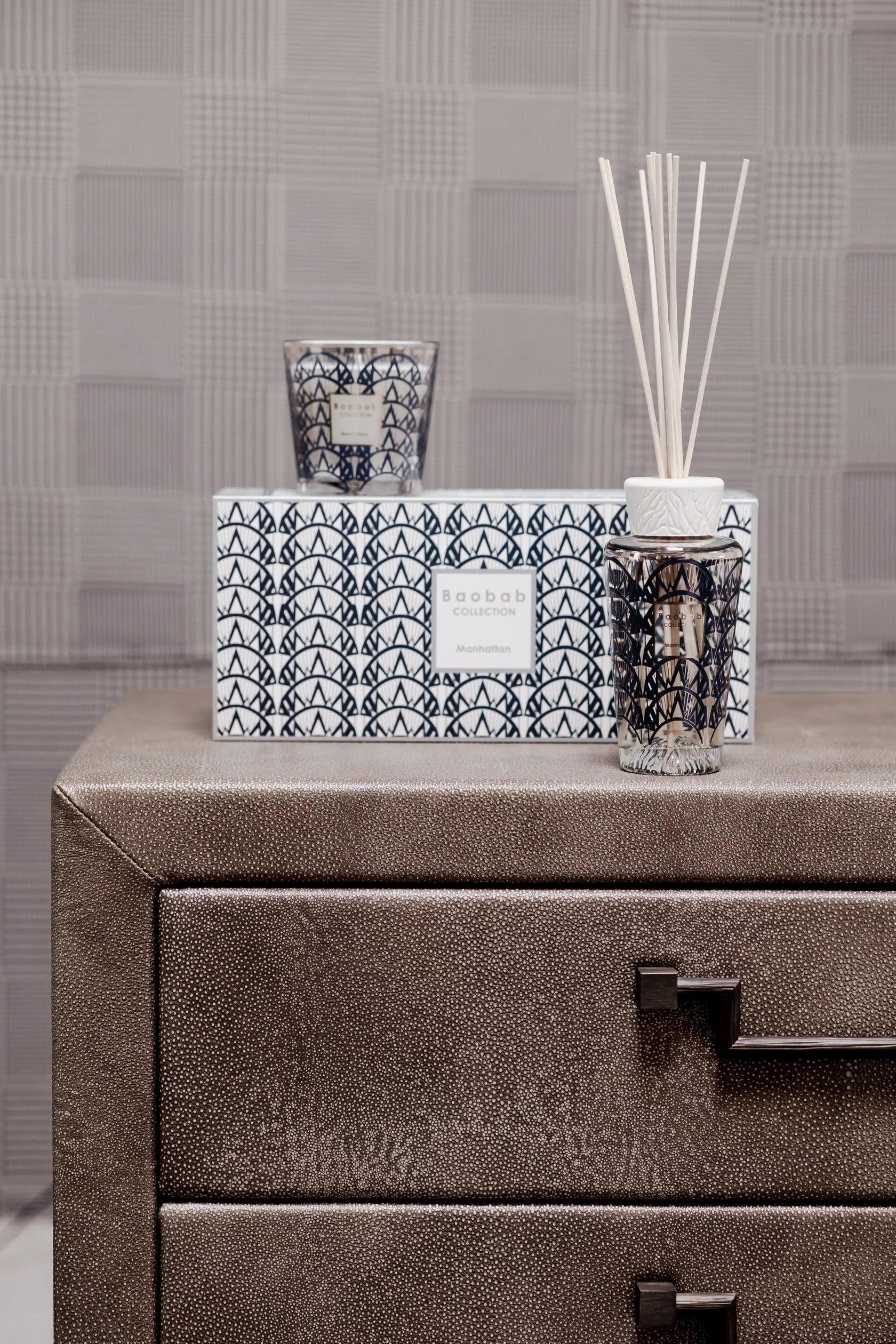 Baobab Collection My First Baobab gift box featuring Manhattan candle and fragrance diffuser on a stylish dresser.