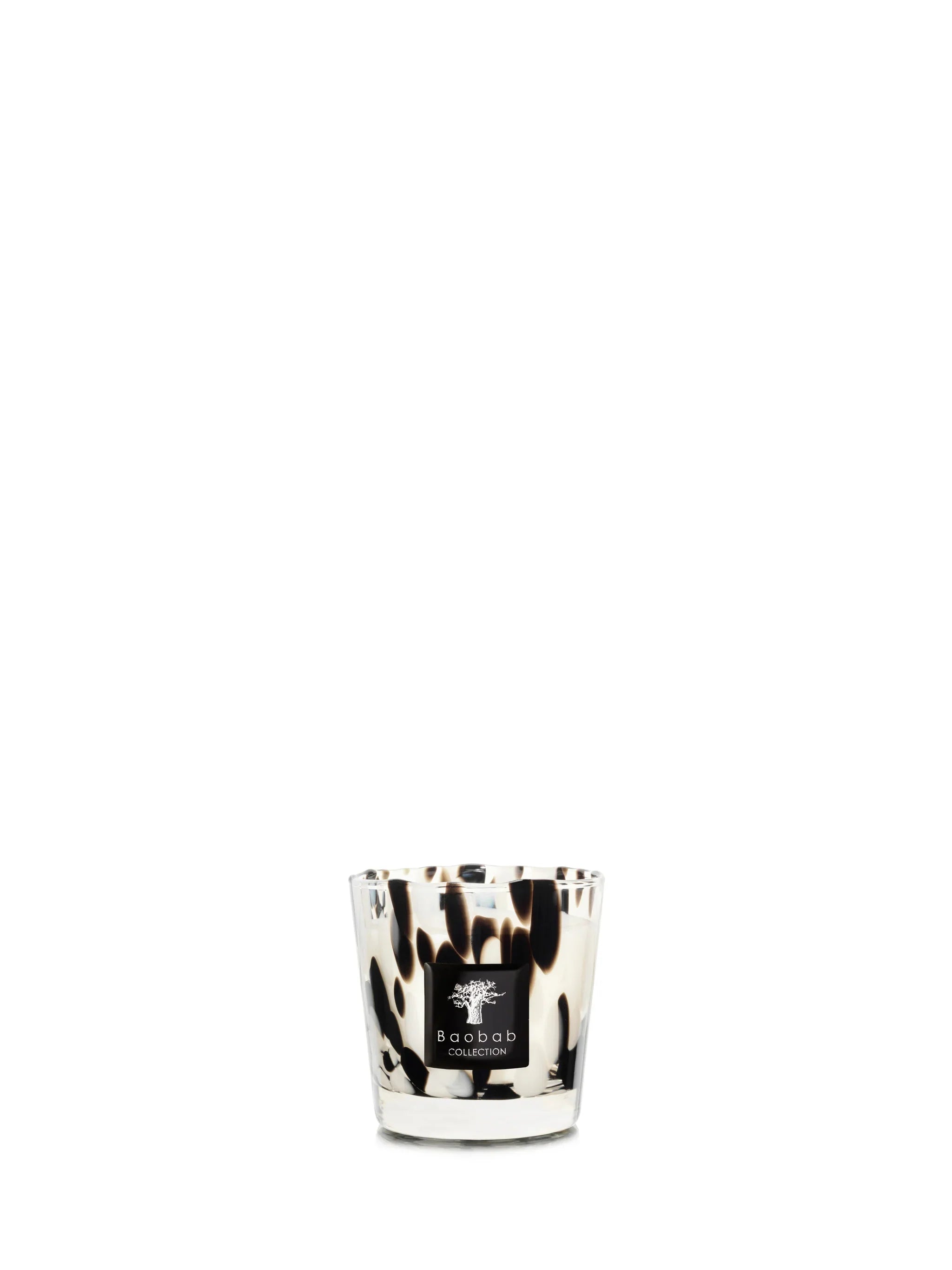 Baobab Collection black and white candle in transparent hand-blown glass, featuring Black Pearls scent.