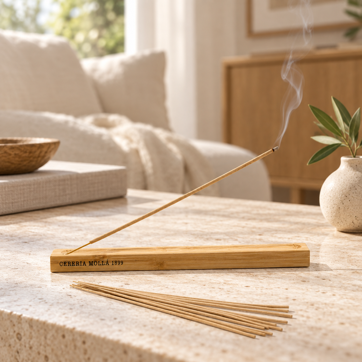 Cereria Molla bamboo incense holder in a refined daytime interior