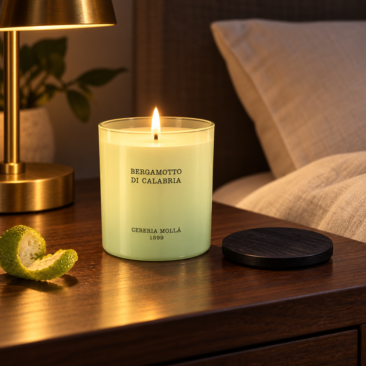 Cereria Molla Bergamotto di Calabria 230 g candle in an elegant evening bedroom