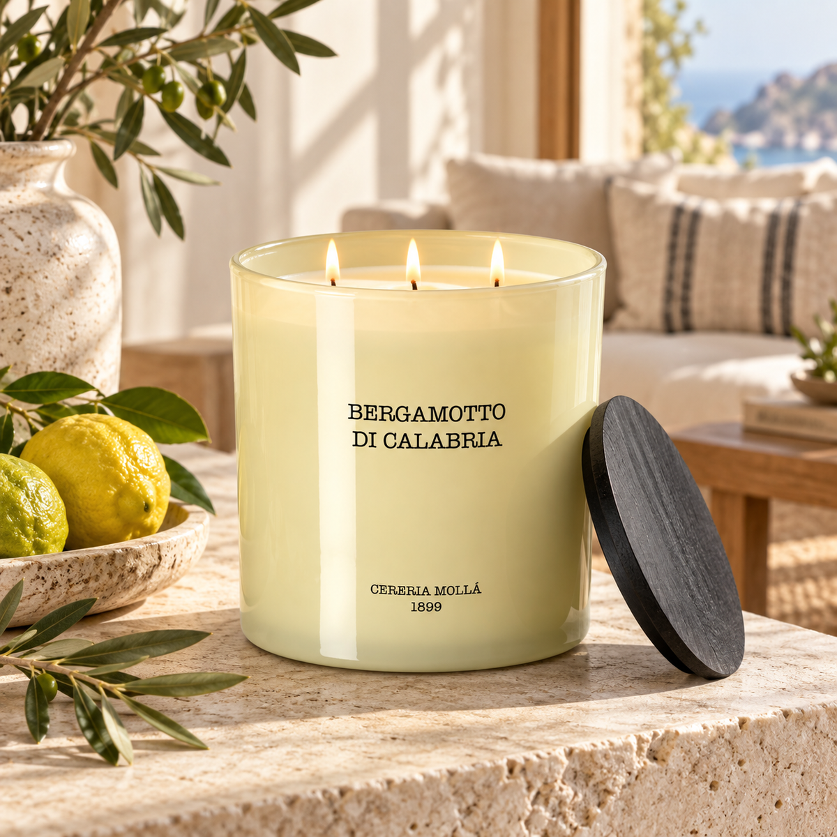 Cereria Molla Bergamotto di Calabria 3-wick XL candle in a Mediterranean interior