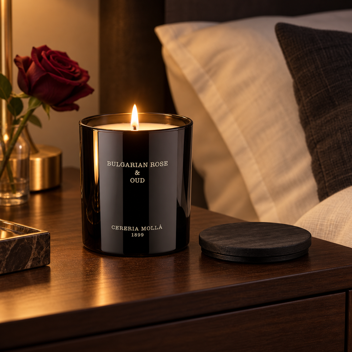Cereria Molla Bulgarian Rose & Oud 230 g candle in an elegant evening bedroom