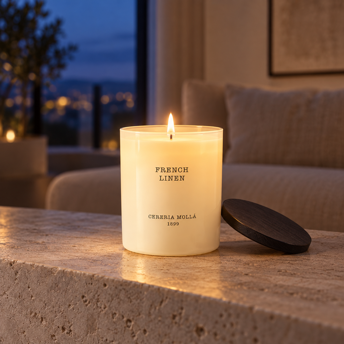 Cereria Molla French Linen Ivory 230 g candle in an elegant evening interior