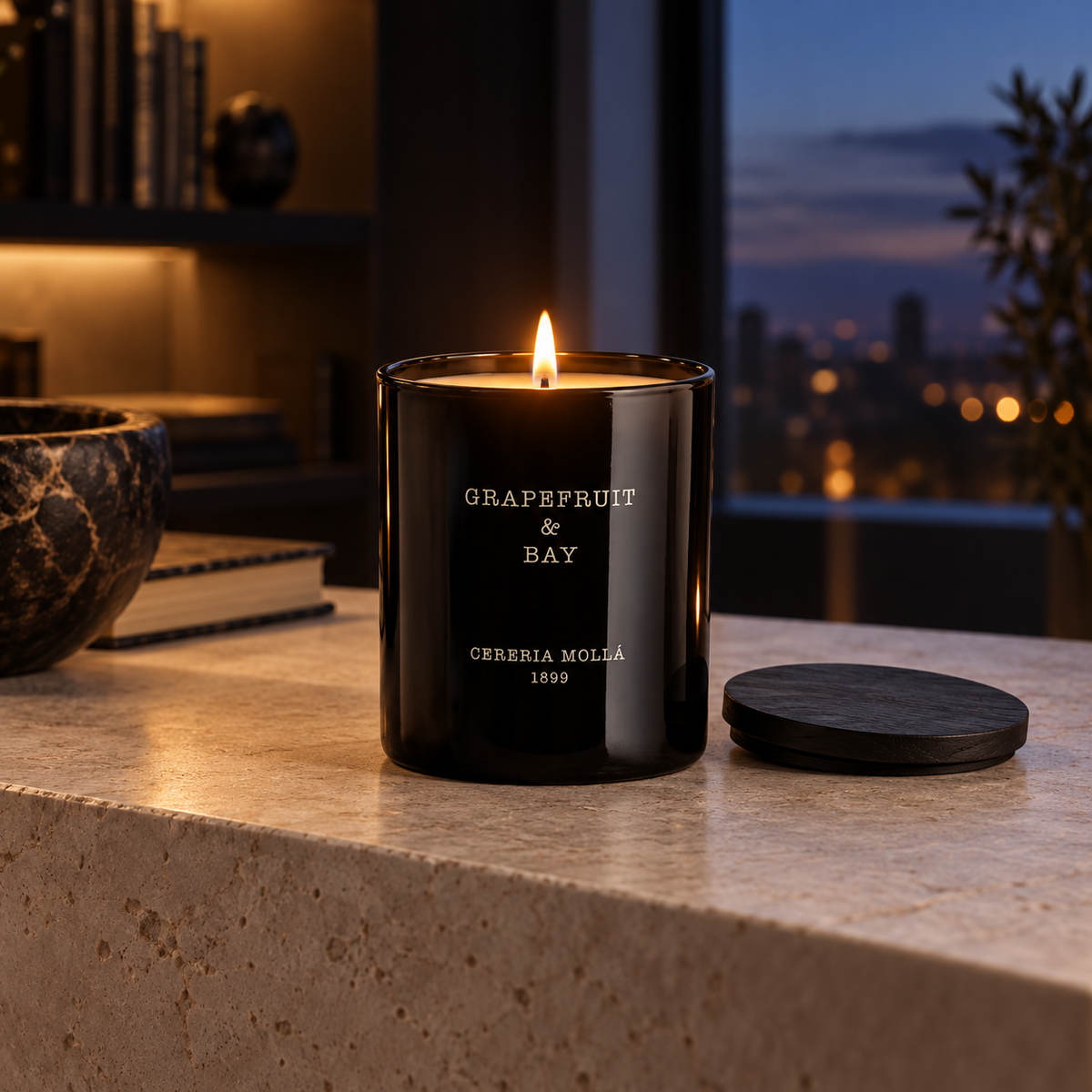Cereria Molla Grapefruit & Bay 230 g candle in an elegant evening interior