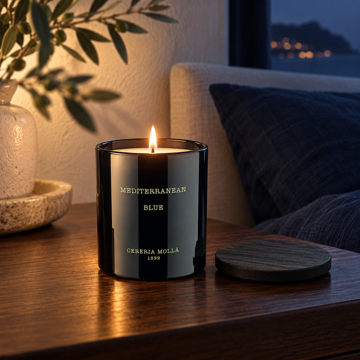 Cereria Molla Mediterranean Blue Black 230 g candle in an elegant coastal evening interior