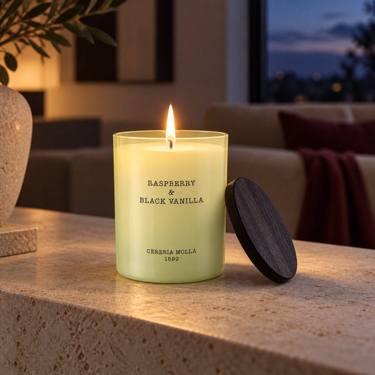 Cereria Molla Raspberry & Black Vanilla 230 g candle in an elegant evening interior