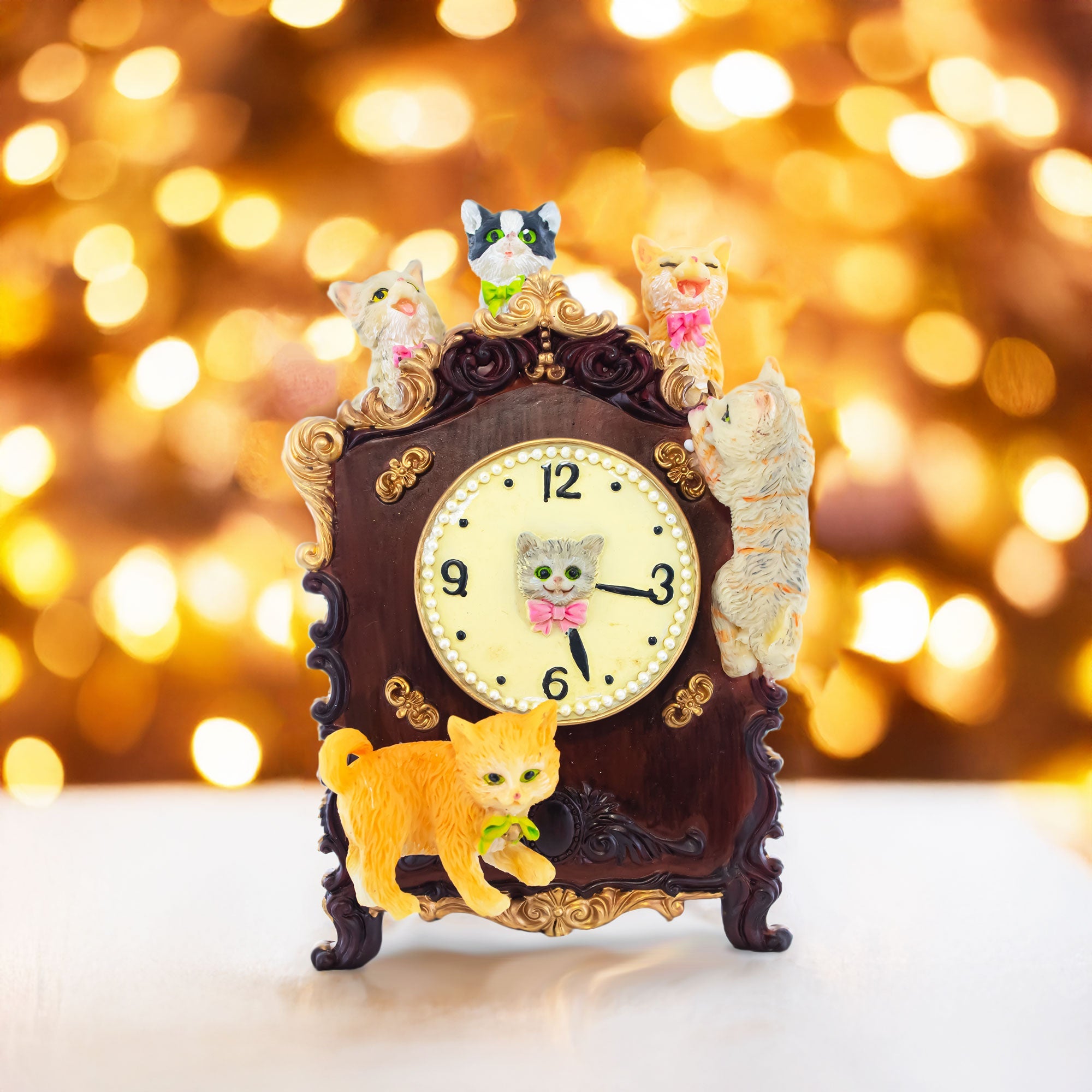 Animated Musical Figurine with Playful Felines