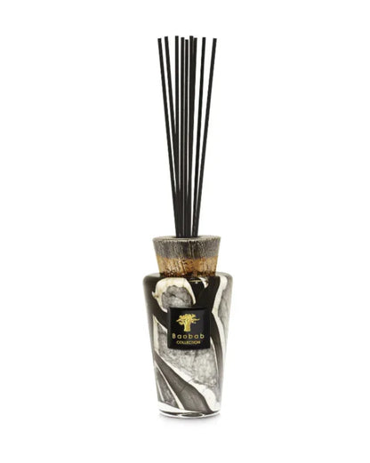 Baobab Collection Totem Stones Marble diffuser with black and silver ceramic cap, featuring fragrance sticks.