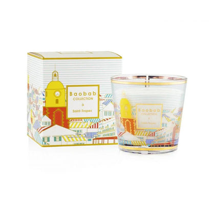 Baobab Collection Saint-Tropez scented candle with colorful packaging and a picturesque design featuring village rooftops.