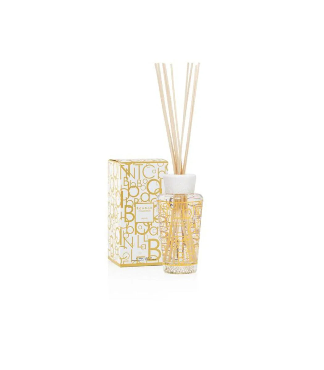 Baobab Collection diffuser My First Baobab Aurum 250 ml with golden packaging and fragrance sticks.