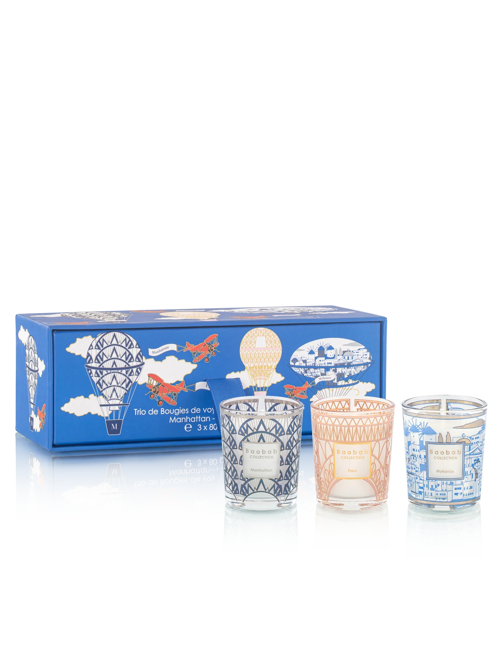 Baobab Collection Trio Travel Candles Manhattan, Paris, Mykonos in decorative packaging with vibrant colors.