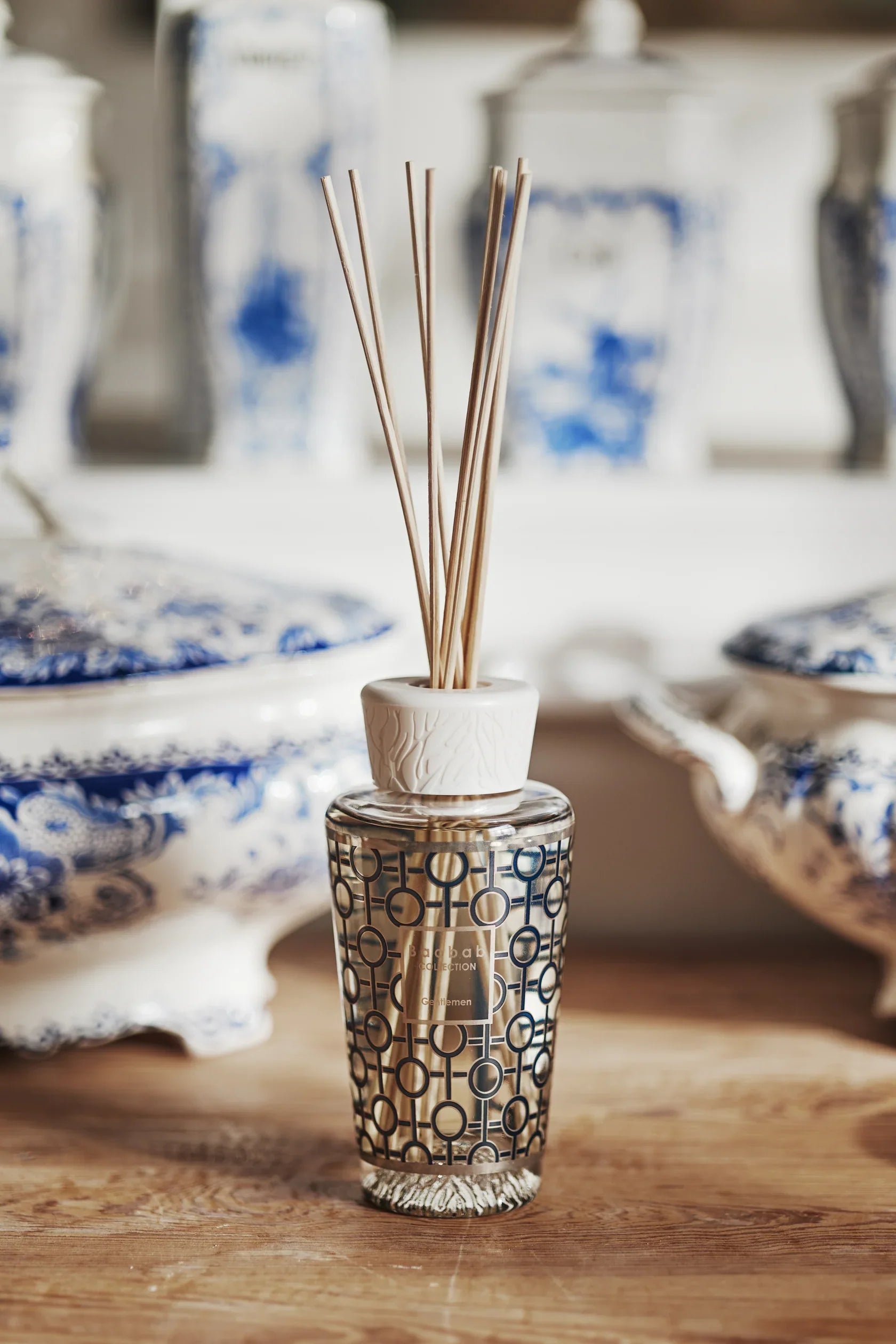 Luxury Baobab diffuser in platinum and ultramarine design with scent sticks for a masculine home fragrance.