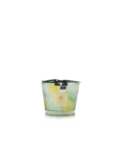 Hand-blown Baobab Collection scented candle in green and yellow hues, inspired by organic shapes.