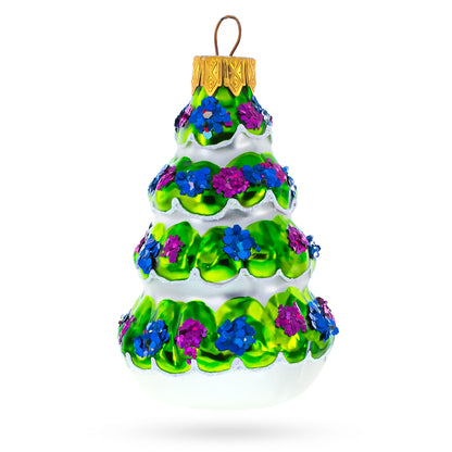 Snow-Covered Garland Tree Glass Christmas Ornament