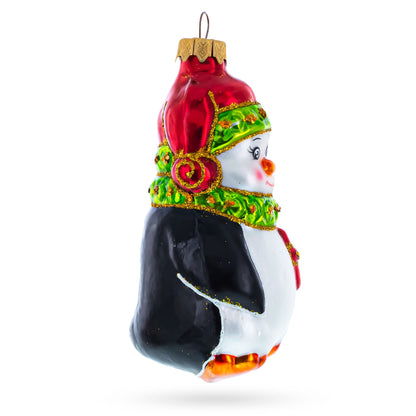 Penguin in Santa Hat with Red Present Glass Christmas Ornament