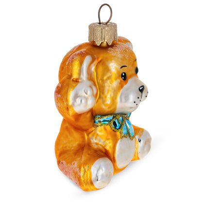 Golden Bear with Blue Bow and Raised Paws Glass Christmas Ornament