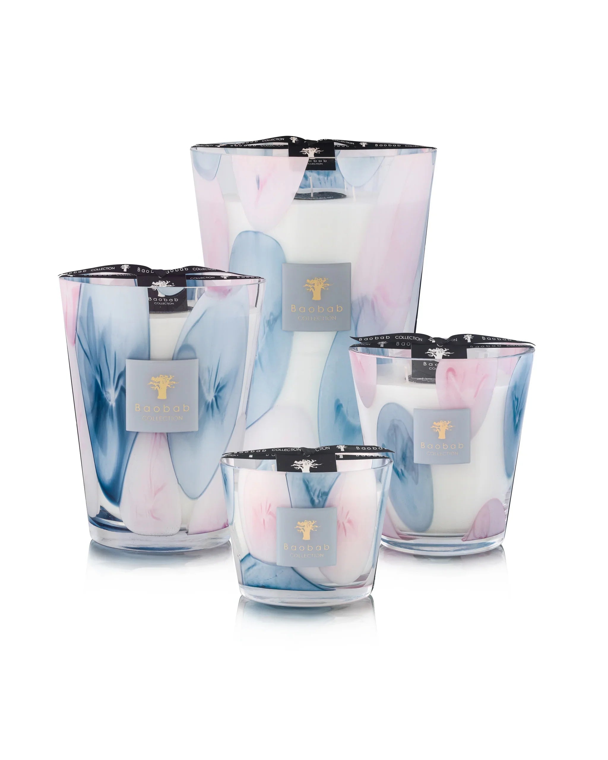 Baobab Collection scented candles in transparent glass with pink and blue designs, inspired by the French Riviera.