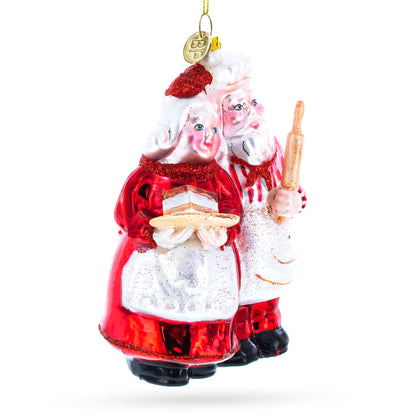 Mr. and Mrs. Santa Baking Cake Glass Christmas Ornament