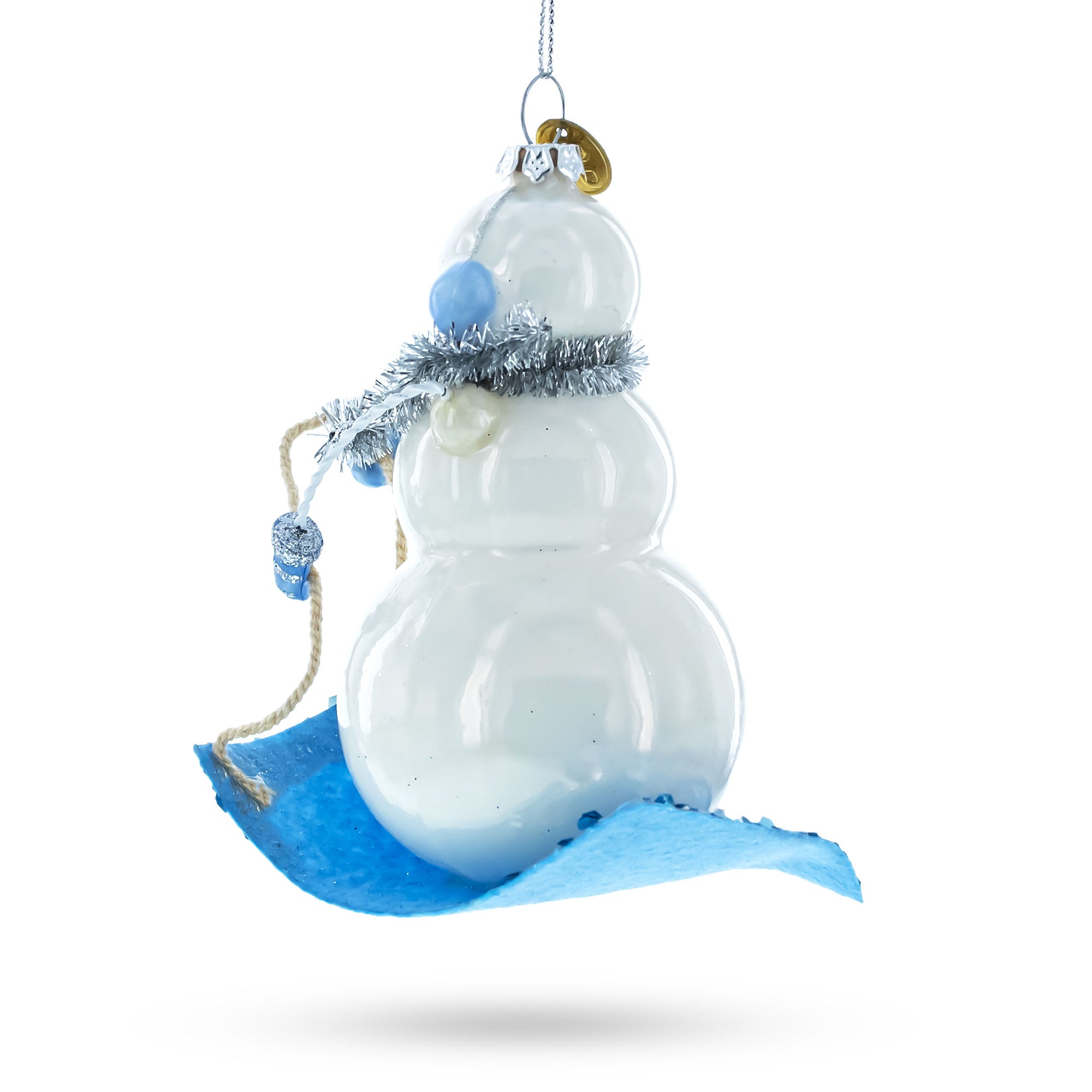 Snowman Riding a Sled Glass Christmas Ornament