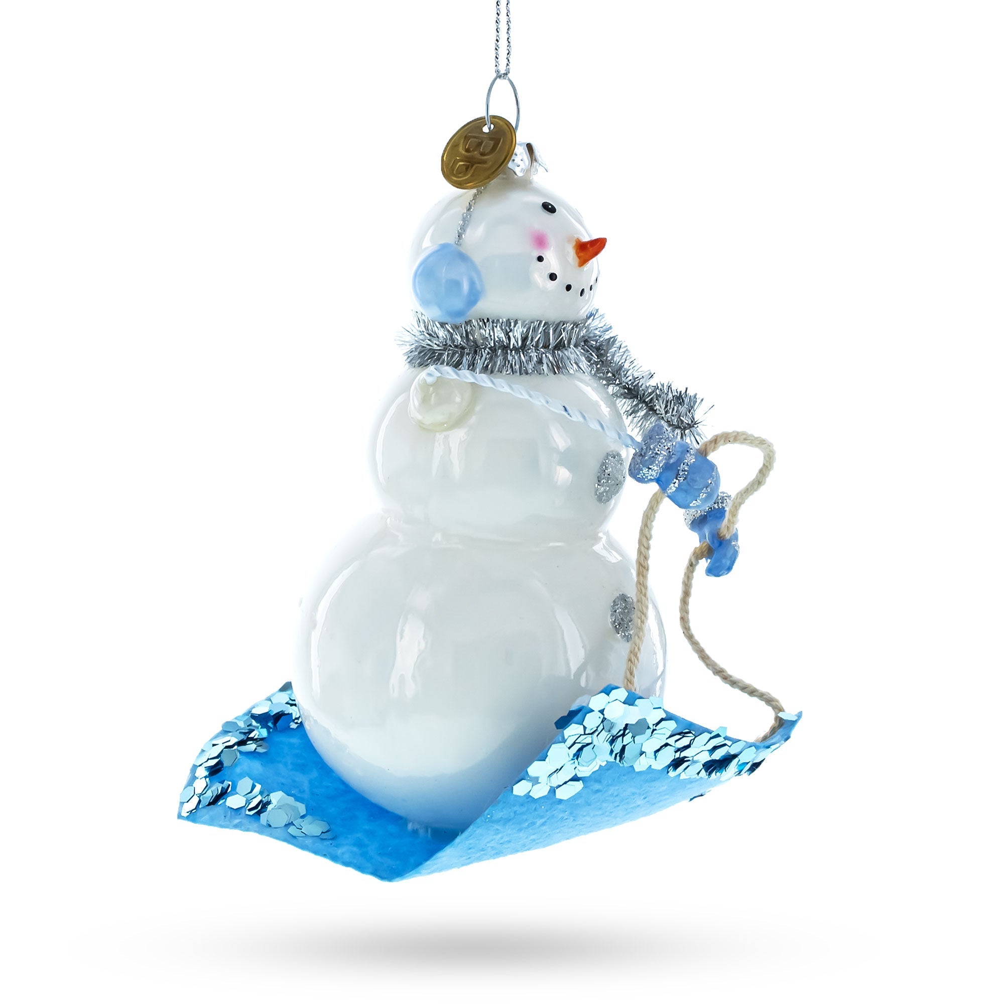 Snowman Riding a Sled Glass Christmas Ornament