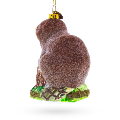Beaver Holding a Log Glass Christmas Ornament