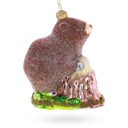 Beaver Holding a Log Glass Christmas Ornament