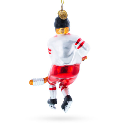 Hockey Player Glass Christmas Ornament