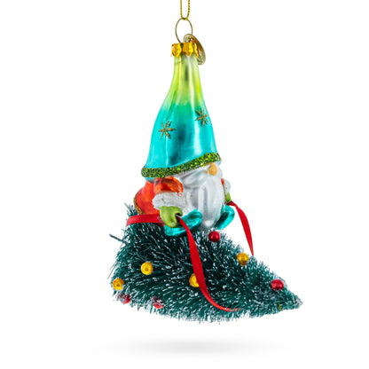 Gnome Adventurer Riding a Festive Tree Glass Christmas Ornament