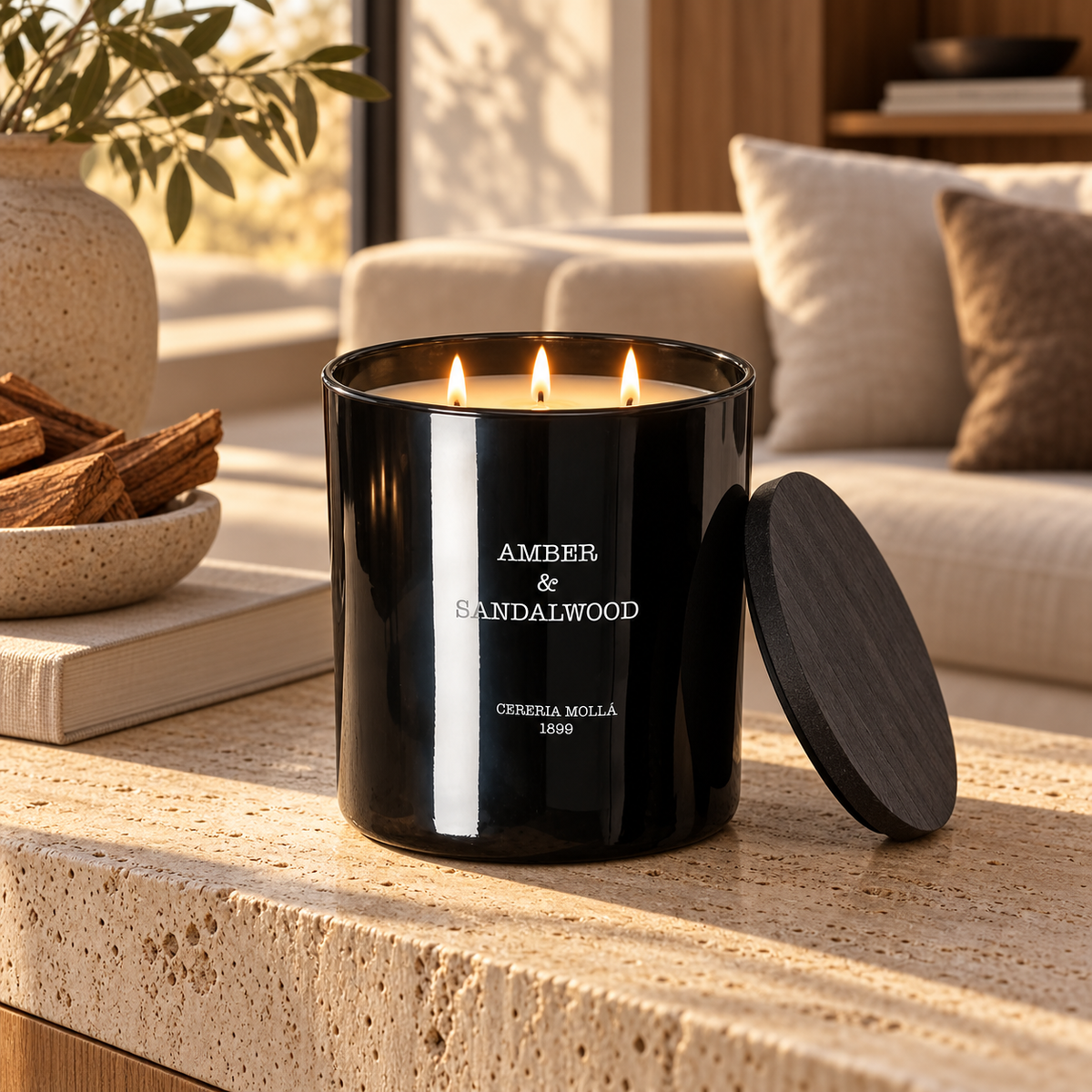 Cereria Molla Amber & Sandalwood 3-wick XL candle in a luxury living room