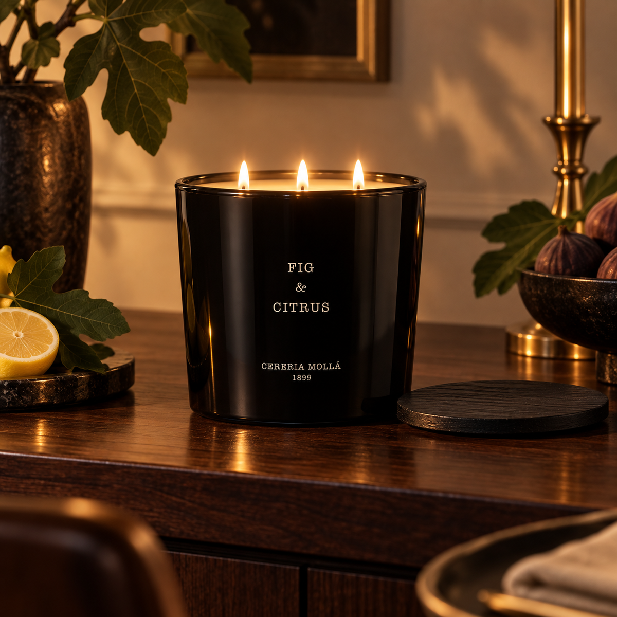 Cereria Molla Fig & Citrus 600 g XL candle in a sophisticated evening dining room