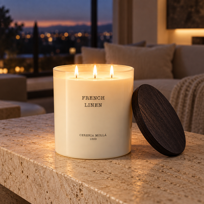 Cereria Molla French Linen Ivory XL 600 g three-wick candle in an elegant evening interior