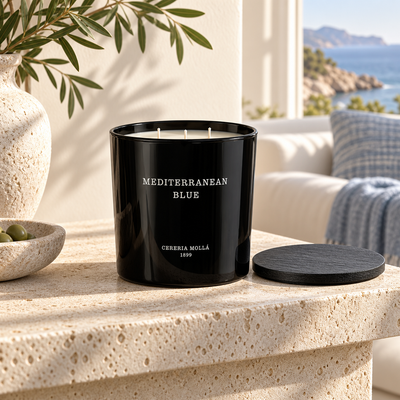 Cereria Molla Mediterranean Blue Black 600 g XL candle in a sunlit coastal living room