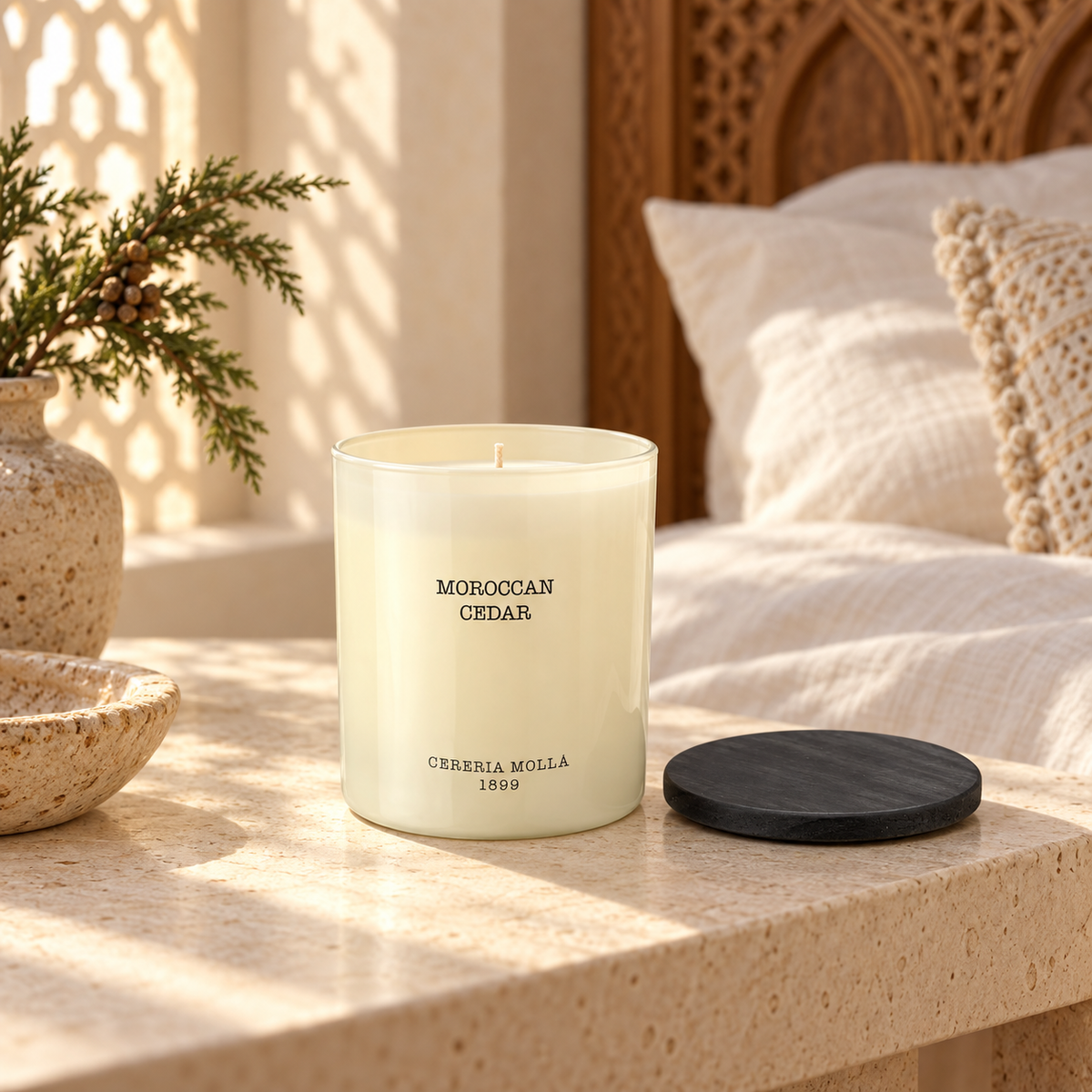 Cereria Molla Moroccan Cedar 230 g candle in a sunlit refined bedroom