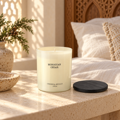 Cereria Molla Moroccan Cedar 230 g candle in a sunlit refined bedroom