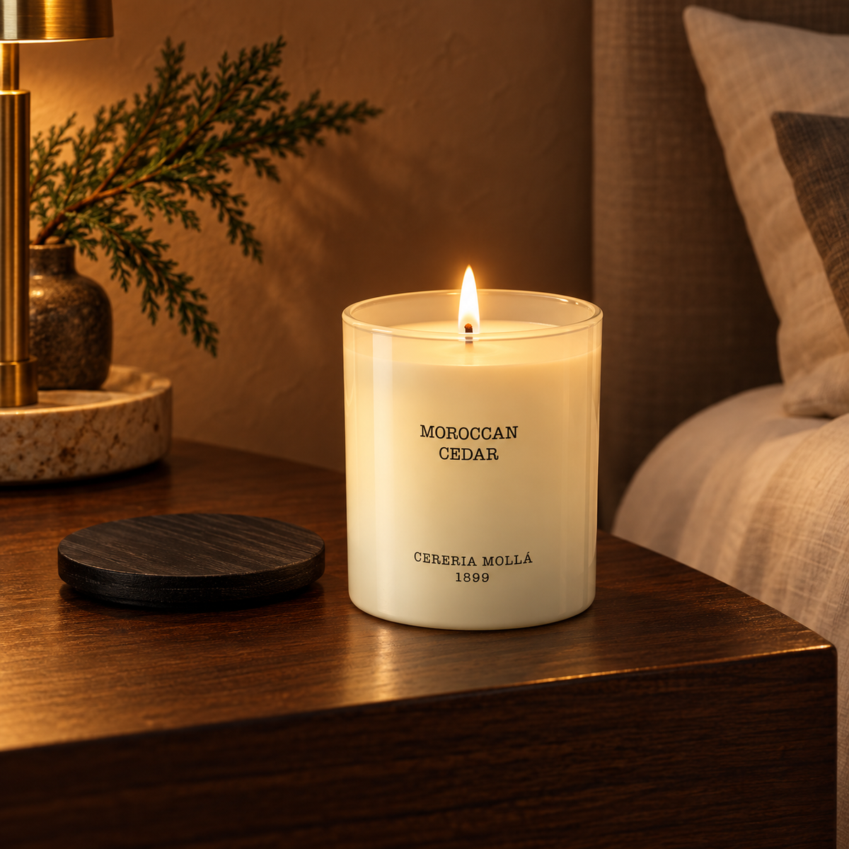 Cereria Molla Moroccan Cedar 230 g candle in an elegant evening bedroom