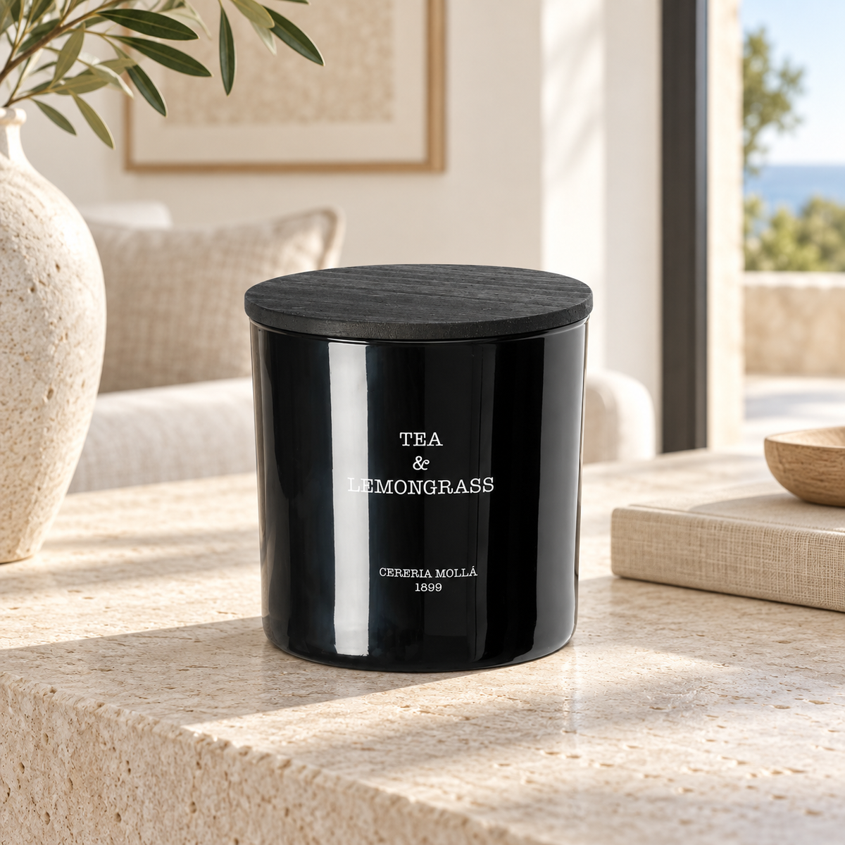 Cereria Molla Tea & Lemongrass XL candle in a sunlit luxury interior
