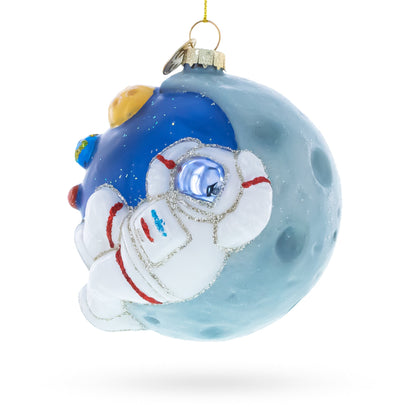 Astronaut on a Moon Glass Christmas Ornament