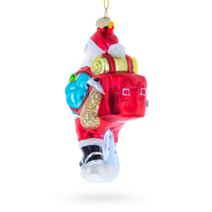 Snowshoeing Santa Glass Christmas Ornament