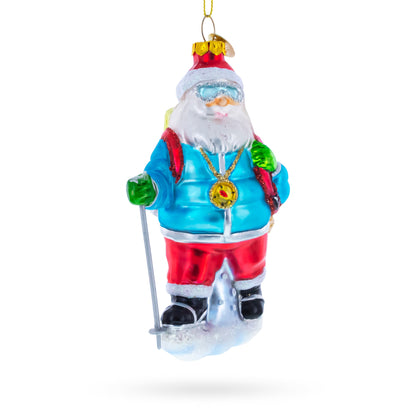 Snowshoeing Santa Glass Christmas Ornament