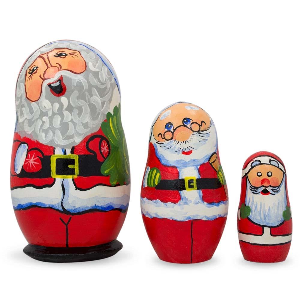 Set of 3 Smiling Santa Figurines Wooden Nesting Dolls 4.25 Inches