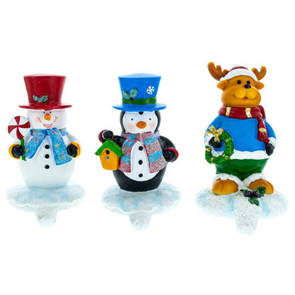 Set of 3 Holiday Stocking Holders Hangers – Snowman, Penguin, and Reindeer Christmas Mantel Decor